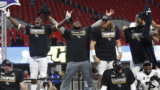 Crown them: UCF celebrates national championship with parade at Disney World