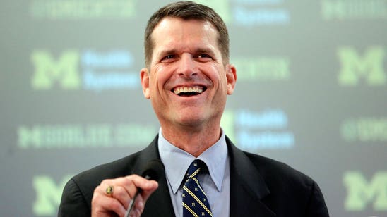 Harbaugh getting a kick out of recruiting