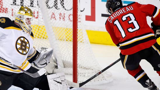Gaudreau finishes hat trick in OT, Flames beat Bruins 5-4