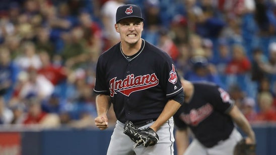 Indians pitcher Trevor Bauer can't get his drone out of a tree