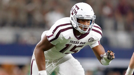 WATCH: A&M DE Myles Garrett tips ball to himself for incredible interception
