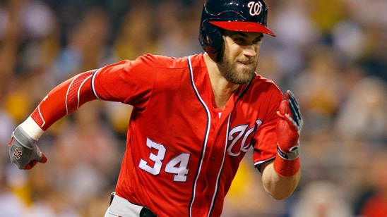 Watch: Bryce Harper leaves game with hand injury after awkward slide