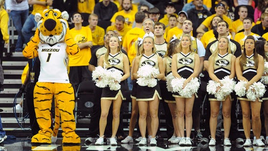 PHOTO: Women's basketball coach Pingeton supporting football program