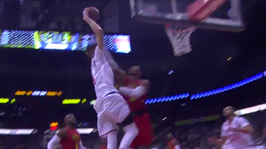 Watch Kristaps Porzingis throw down a massive dunk on Dwight Howard