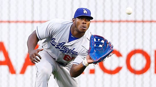 Watch Yasiel Puig barehand ball, rifle a strike to second for unlikely force-out