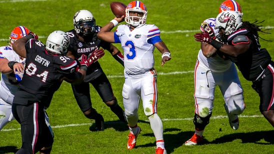 Gators withstand Gamecocks’ 4th-quarter rally, keep playoff hopes alive