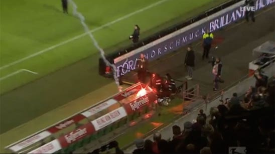 Wolfsburg fans hurl flare into Hannover dugout ahead of Bundesliga match