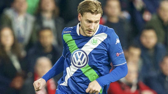 Wolfsburg chief brands ex-Arsenal striker Bendtner a failure