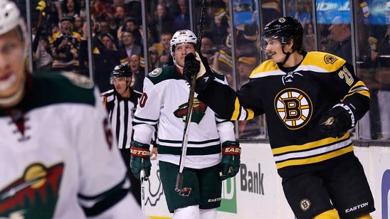 Eriksson's hat trick lifts Bruins over slumping Wild