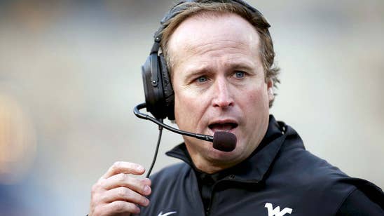 Dana Holgorsen loved the Texas win so much he went surfing (VIDEO)