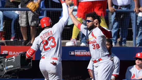 Ozuna's two-homer day helps lift Cards to 9-5 win over Reds in Mexico
