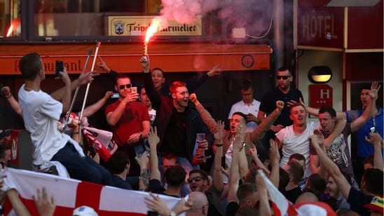 Fans clash with police amid tense scenes in French city of Lille