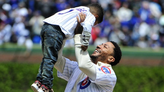 Derrick Rose's son throws out first pitch at Cubs game