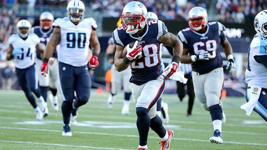 Patriots hold on to top spot in AFC after roughing up Titans