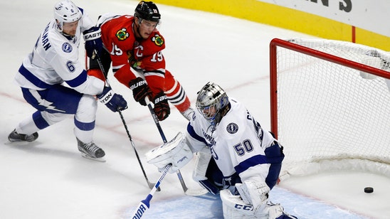 Toews nets first goal in OT, 'Hawks top Lightning in Cup Final rematch