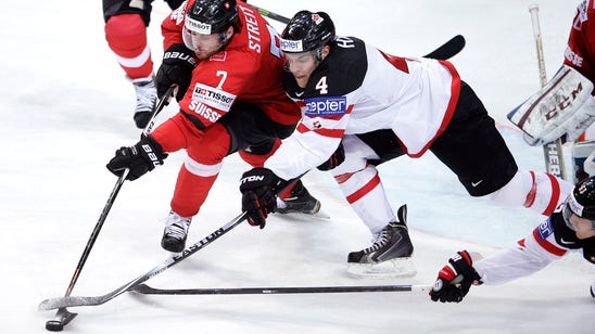 Ennis helps Canada hop out to lead at World Championships (VIDEO)
