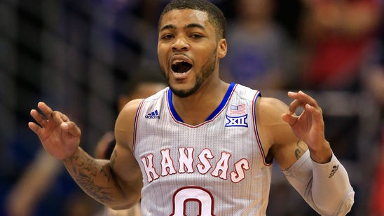 Jayhawks score sloppy 75-69 victory over Harvard