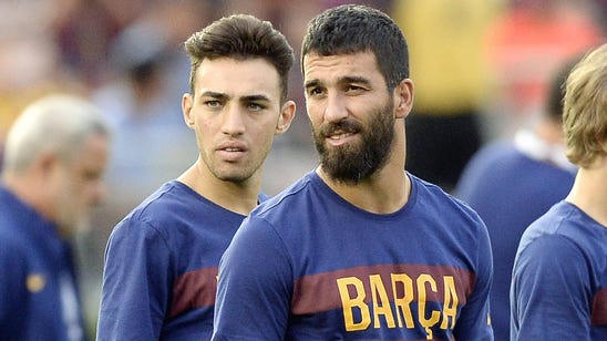 Barcelona midfielder Turan sprains ankle during training session