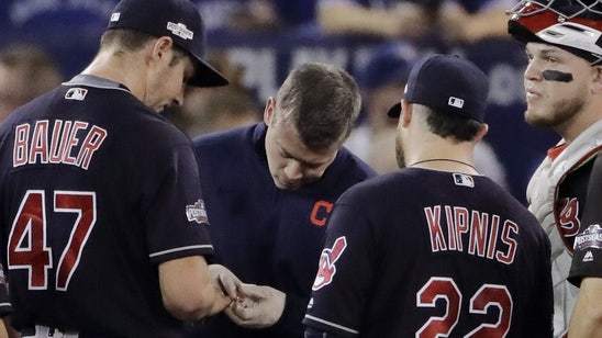 Bauer leaves in first inning after blood drips from finger