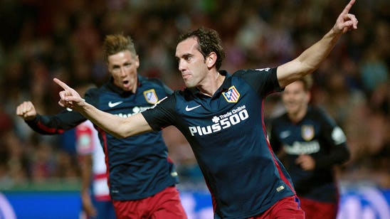 Atletico Madrid maintain hot streak, sink lowly Granada