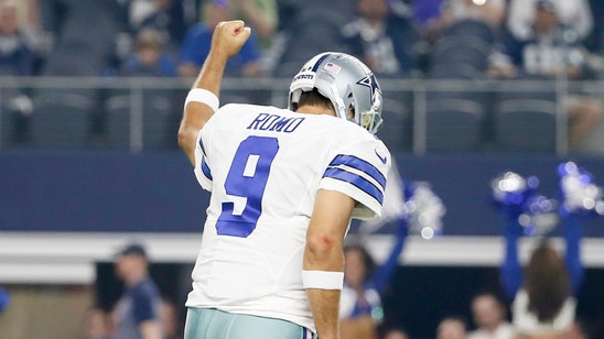 Romo leads Cowboys to 14-13 halftime lead over Vikings
