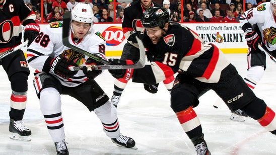 Kane extends point streak to 21 games, but 'Hawks fall to Sens in OT