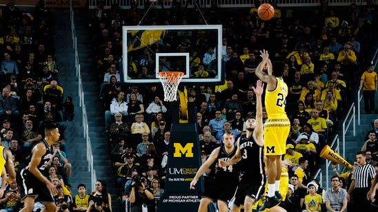 Wolverines hit school-record 17 3-pointers in rout of Bryant
