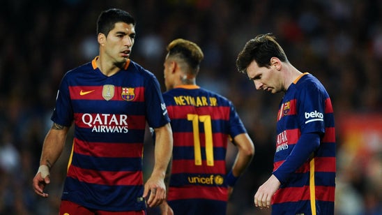Messi scores number 500 but Barcelona still fall to plucky Valencia