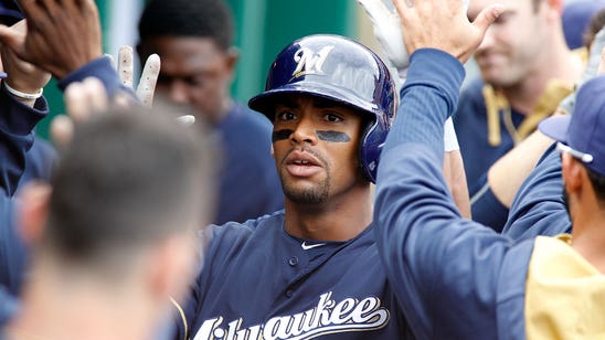 Brewers trade OF Khris Davis to A's for pair of prospects