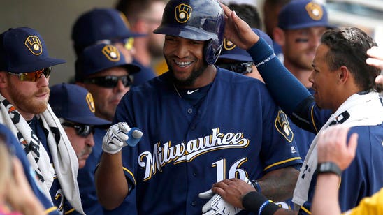 Brewers collect 12 hits, top Rockies 7-6