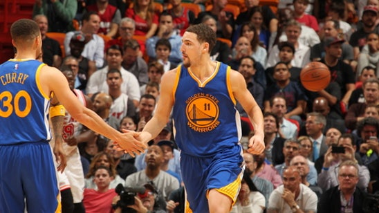 Curry scores 42, Thompson adds 33 as Warriors overcome Wade, Heat