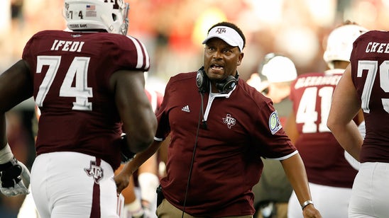 PHOTO: Sumlin breaks out the Swagcopter to watch recruit play