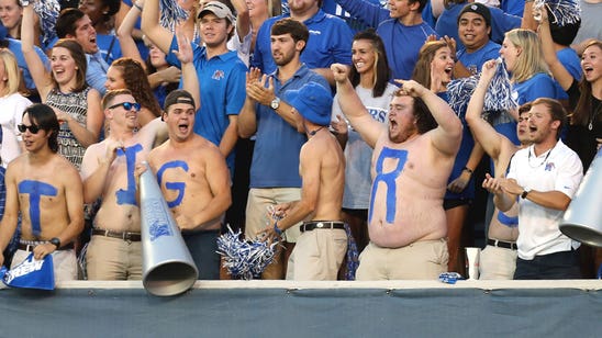 No-shirt alert: Memphis fan playing air guitar won't be mistaken for Elvis