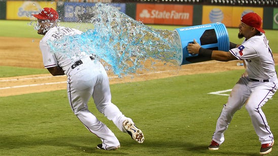 Watch: Beltre can't avoid head touch, runs from Powerade bath after walk-off