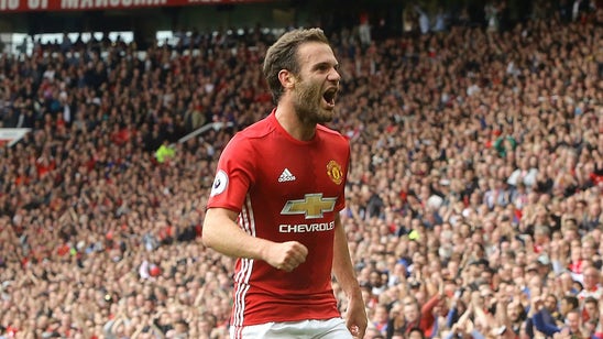 Juan Mata kept the Manchester United bus waiting to take pics with young fan in wheelchair