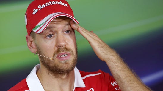 Sebastian Vettel playing down Ferrari expectations