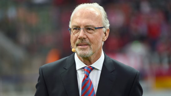 Rummenigge standing by Bayern Munich's honorary president Beckenbauer
