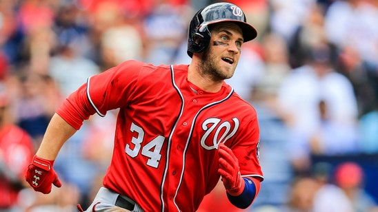 No swings needed as Nationals' Harper walks into record books