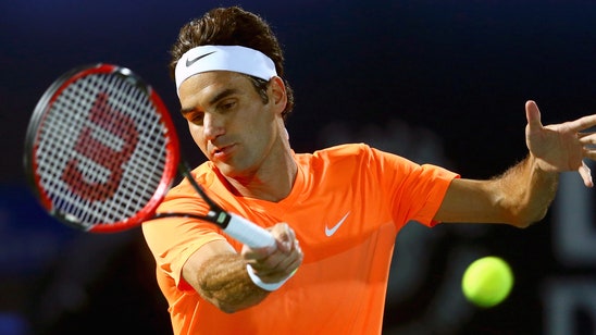 Defending champ Roger Federer tops Mikhail Youzhny in Dubai