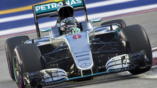 Nico Rosberg takes pole under the lights in Singapore