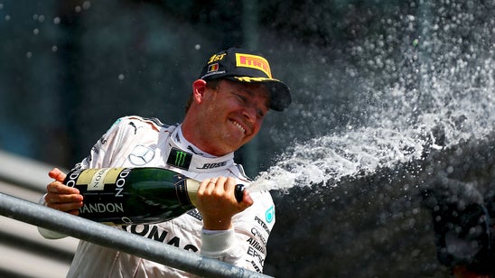 Nico Rosberg wins in Belgium, closes in on Hamilton in title fight
