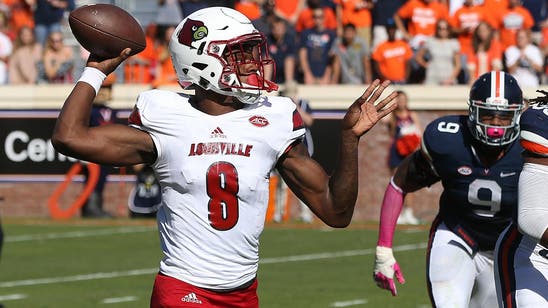 Lamar Jackson delivers Heisman-kind-of-moment in saving No. 5 Louisville at Virginia