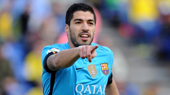 Gunners boss Wenger heaps praise on Barca striker Suarez