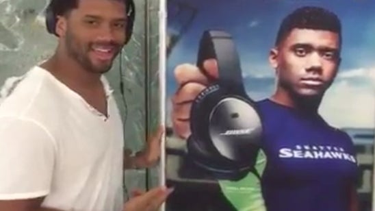 Russell Wilson makes adjustment to J.J. Watt airport ad