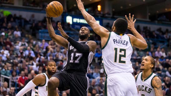 Spurs stay perfect on road, rally past Bucks 97-96