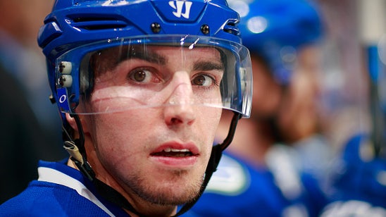 Canucks' Alex Burrows taken to hospital, will miss Game 4