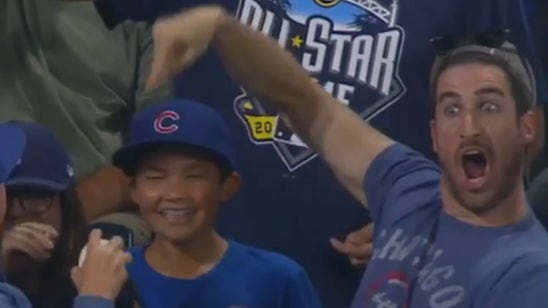 These Cubs fans completely freaked out after catching Kris Bryant's homer
