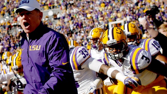 LSU coach Les Miles goes to hospital, returns for practice
