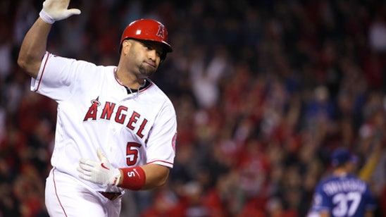 Pujols' walk-off winner in 9th lifts Angels over Rangers for 1st win