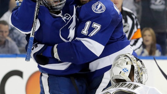 Lightning hold off Penguins' late rally to even series 2-2